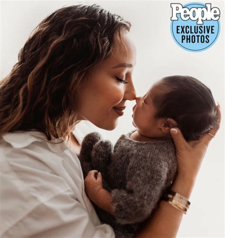 Adrienne Bailon explains why she kept her baby news quiet