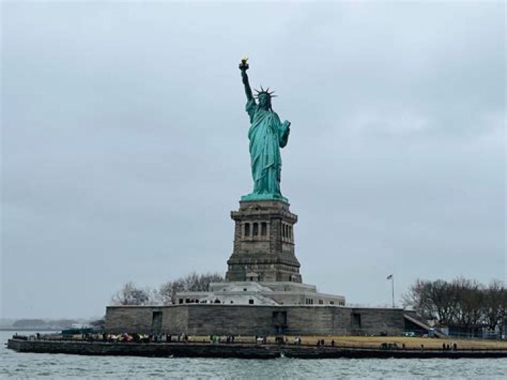 Unveil The Enchanting Presence Of Deer At The Statue Of Liberty